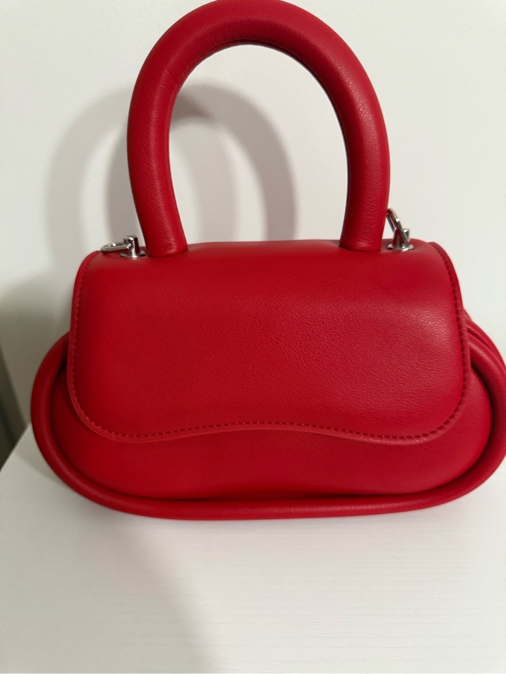 Red Structured Top-Handle bag  comes with Crossbody strap vegan leather